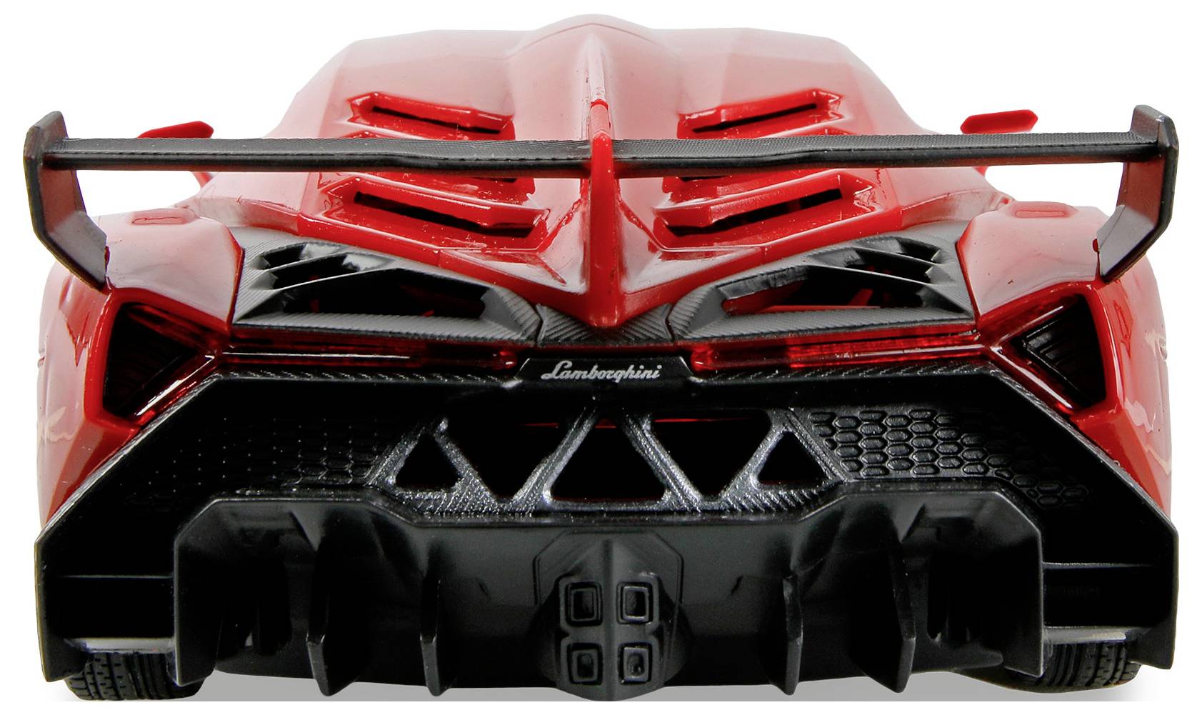 Czerwony samochód sportowy widziany od tyłu, z wyraźnym skrzydłem, skomplikowaną tylną bryłą nadwozia oraz logo Lamborghini na błyszczącej powierzchni.