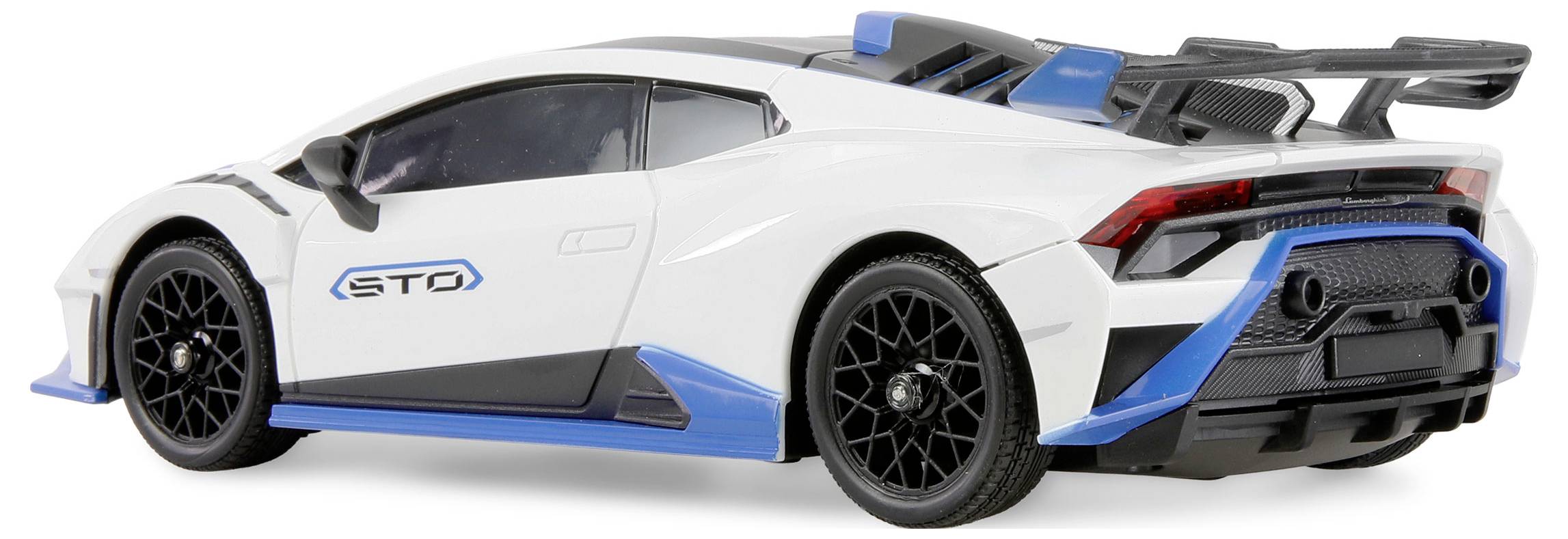 Biały i niebieski samochód sportowy o opływowym wzornictwie posiada charakterystyczne logo 'STO' na boku.