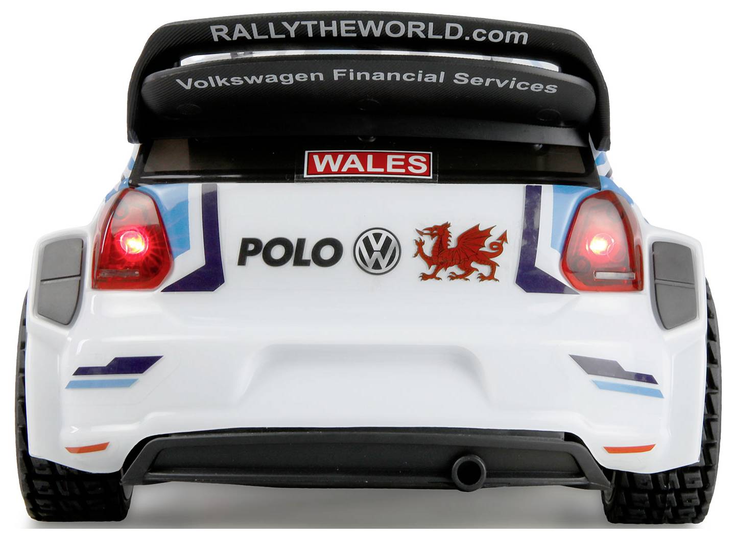 Widok tylnej części samochodu wyścigowego z napisem 'RALLYTHEWORLD.com' i 'Volkswagen Financial Services' na skrzydle, tablicą rejestracyjną 'Wales' oraz czerwonym logo smoka.