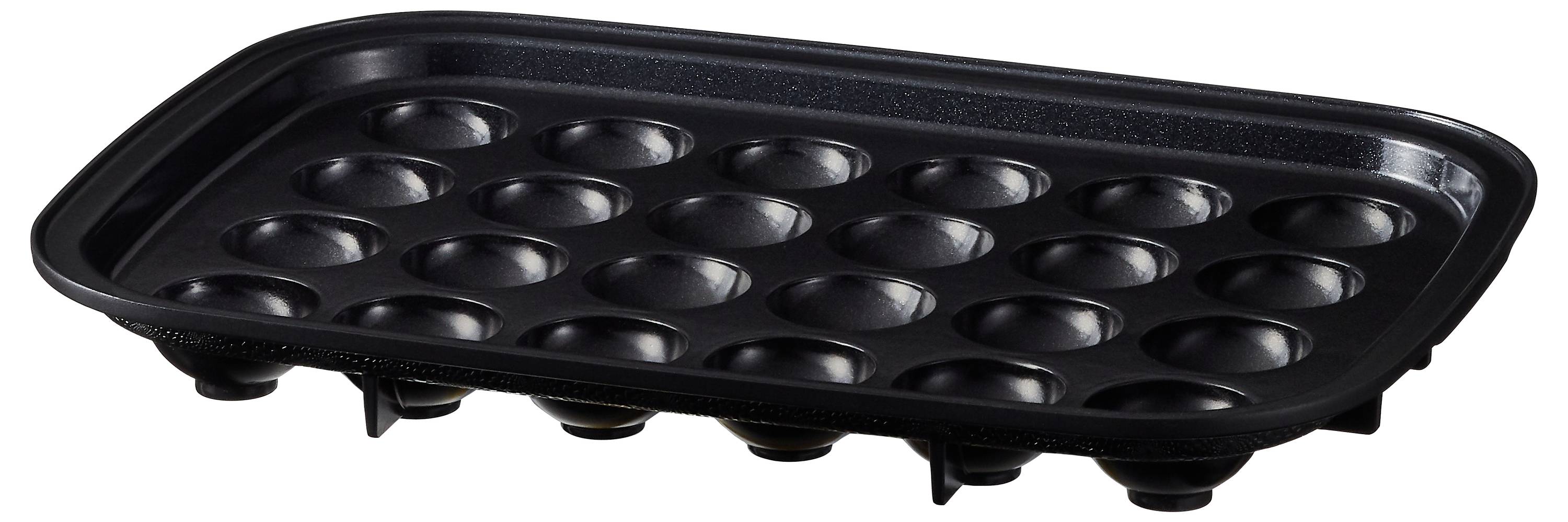 Czarna, nieprzywierająca patelnia do takoyaki z wieloma okrągłymi formkami do przygotowywania japońskich kulek ośmiornicy.