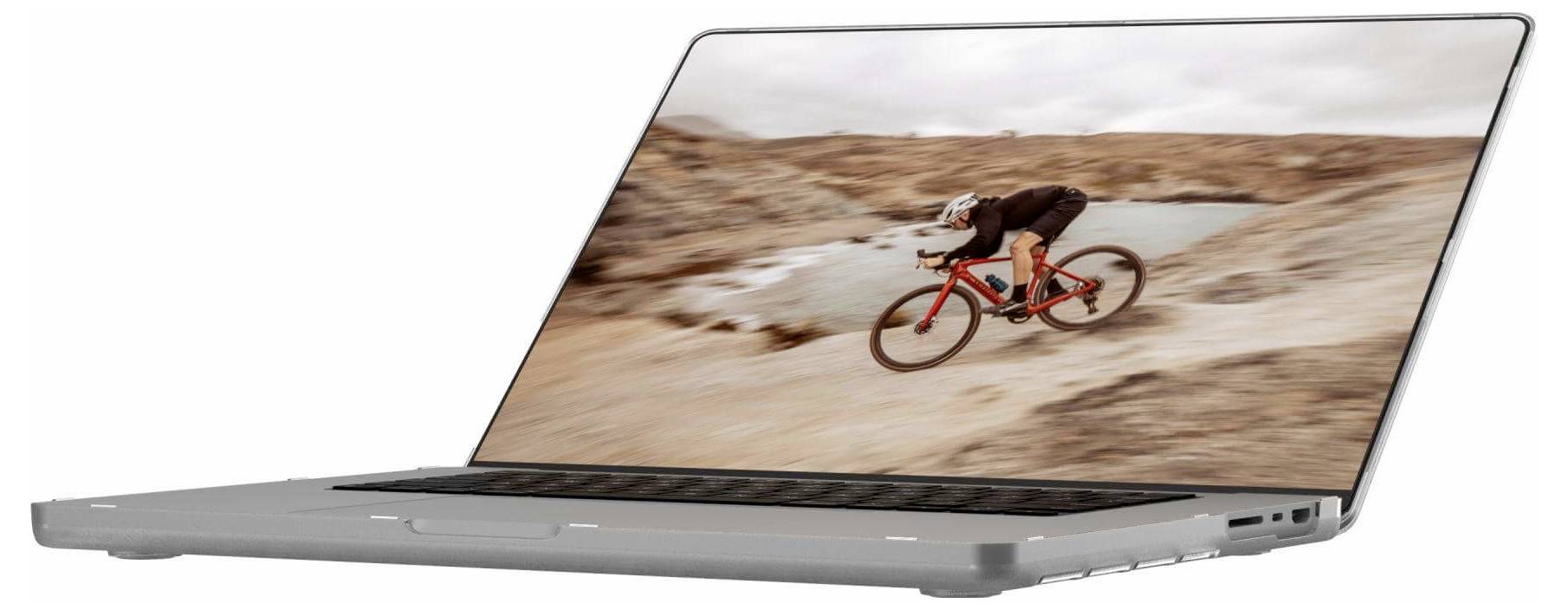 Laptop wyświetlający obraz rowerzysty jadącego na czerwonym rowerze przez skalistą przestrzeń, oddający dynamikę i ducha przygody.