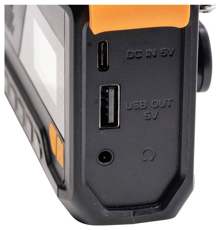 Przenośny power bank widziany z boku, z wejściem USB-C oznaczonym jako "DC IN 5V", wyjściem USB-A oznaczonym jako "USB OUT 5V" oraz gniazdem słuchawkowym.