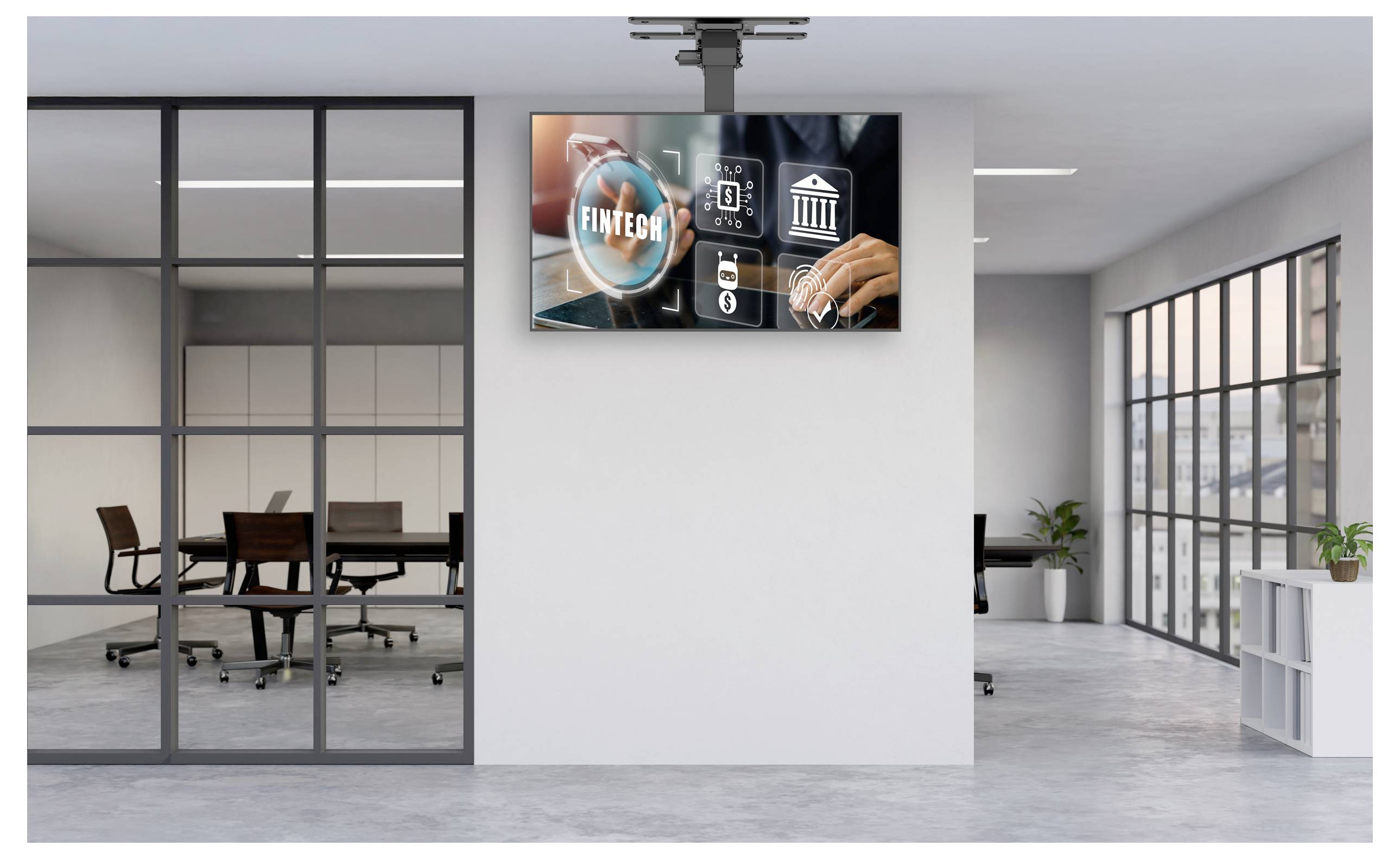 Sala spotkań biurowych ze ściennym ekranem wyświetlającym "Fintech" i cyfrowymi ikonami finansowymi, symbolizującymi nowoczesną technologię finansową.