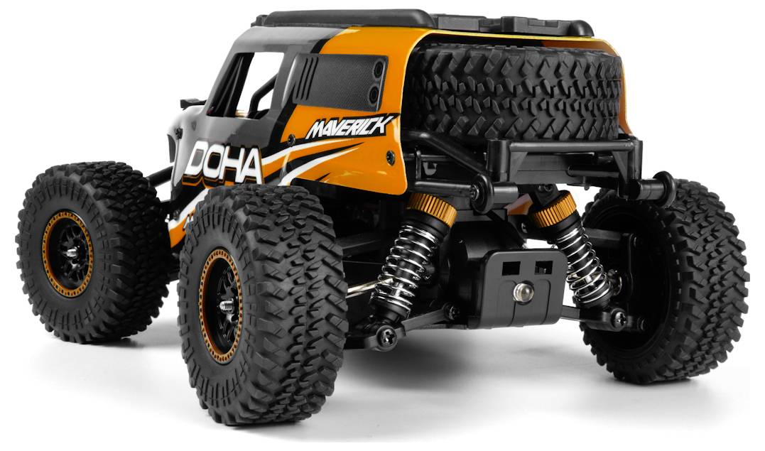 Zdalnie sterowany pojazd terenowy w kolorze pomarańczowo-czarnym z dużymi, bieżnikowymi oponami i widocznym zawieszeniem, ustawiony tak, aby pokazać tylną i boczną część.