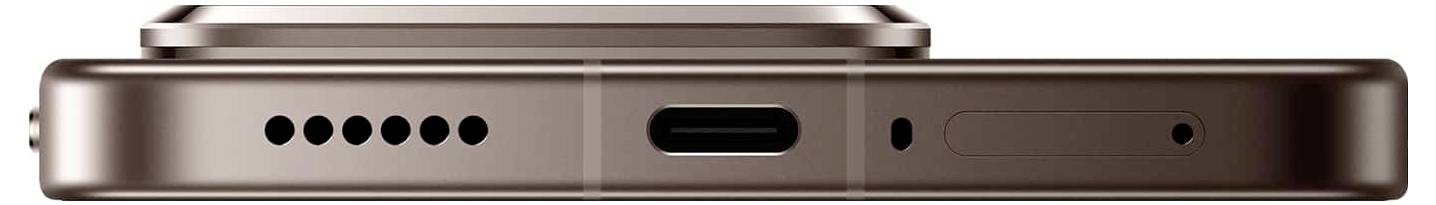 Widok od dołu brązowego smartfona z portem USB-C, otworami głośnika po lewej stronie oraz otworem mikrofonu po prawej stronie.