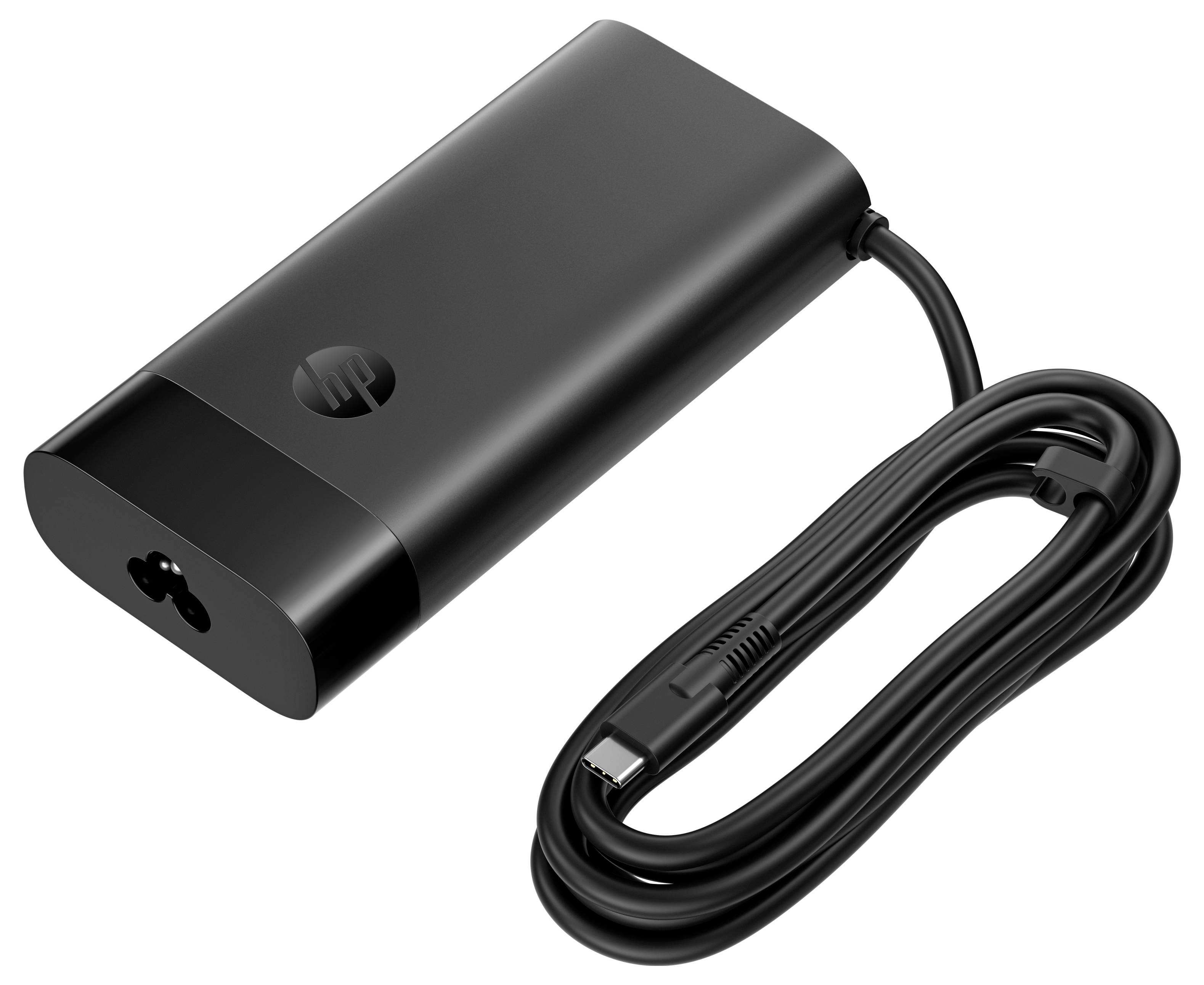 Czarny zasilacz do laptopa z końcówką USB-C, charakteryzujący się zwartą, prostokątną budową. Przewód jest starannie zwinięty obok niego.