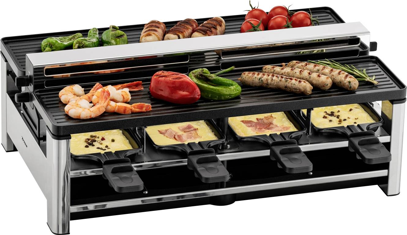 Grill raclette z różnymi produktami spożywczymi: papryka, pomidory, krewetki i parówki na górze; roztopiony ser na dole w małych patelenkach.