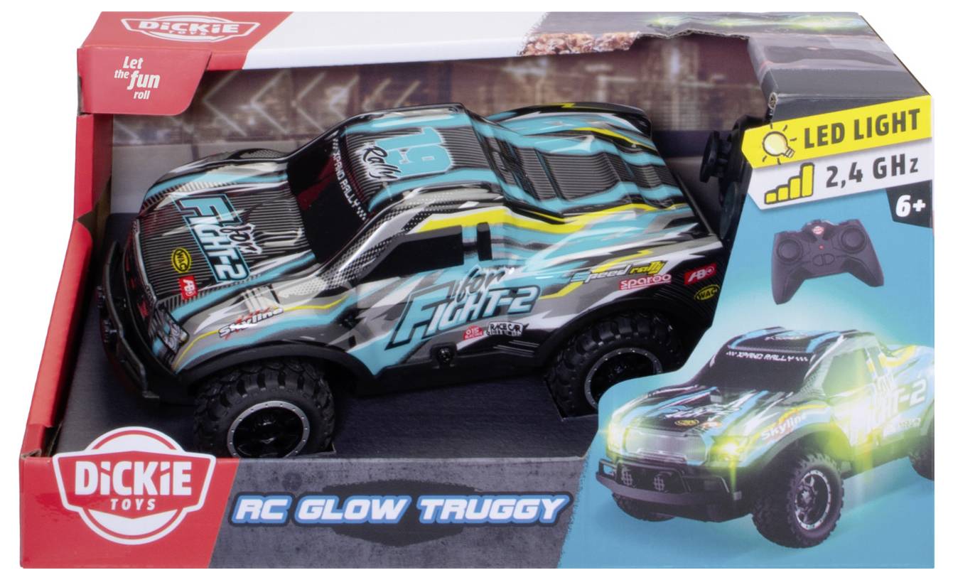 Samochód zabawkowy 'RC Glow Truggy' w opakowaniu, w kolorze czarnym z niebieskimi i zielonymi wzorami, wyposażony w światła LED oraz pilot zdalnego sterowania z częstotliwością 2,4 GHz, przeznaczony dla dzieci powyżej 6 roku życia.