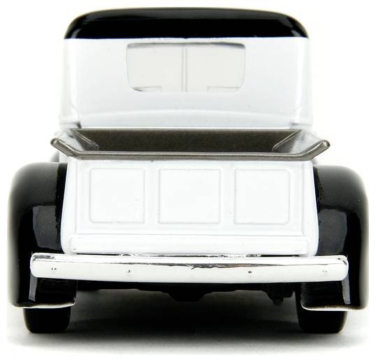 Zabawkowy model zabytkowej czarno-białej ciężarówki widziany od tyłu.