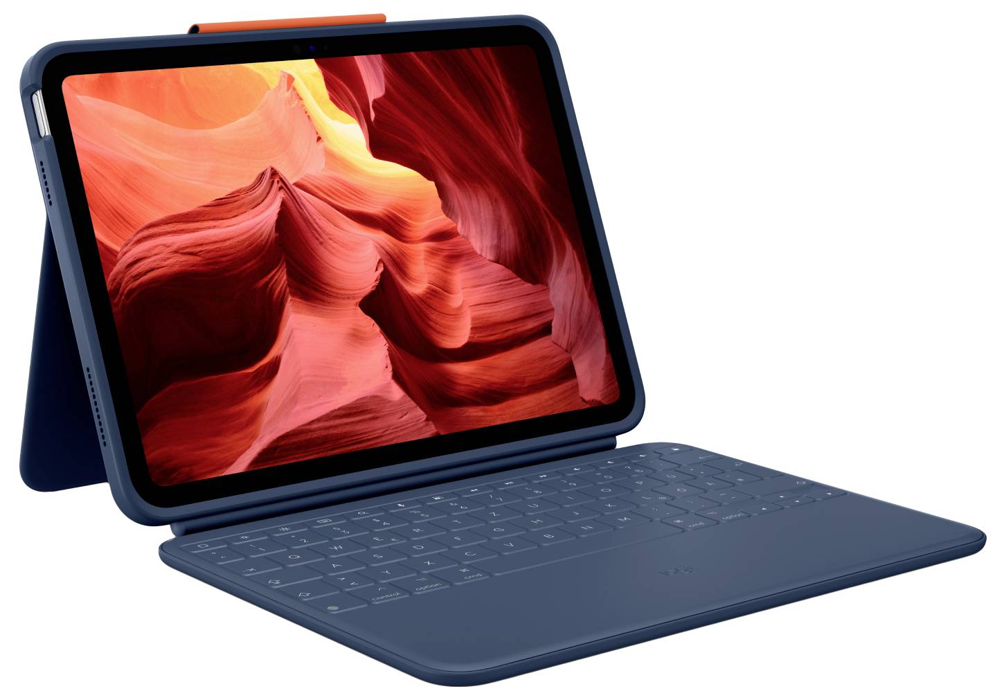 Tablet z żywym obrazem czerwonego kanionu na ekranie, podłączony do niebieskiej klawiatury, ustawiony pod skosem.