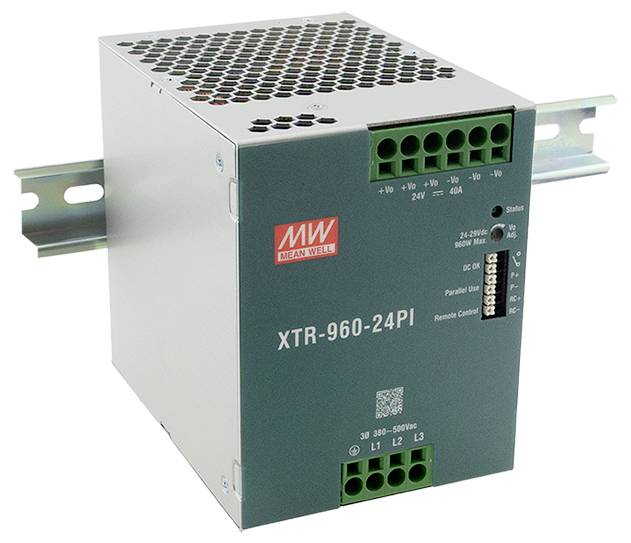 Szary i zielony zasilacz Mean Well XTR-960-24PI jest zamontowany na szynie metalowej, wyposażony w liczne porty przyłączeniowe i elementy wentylacyjne.