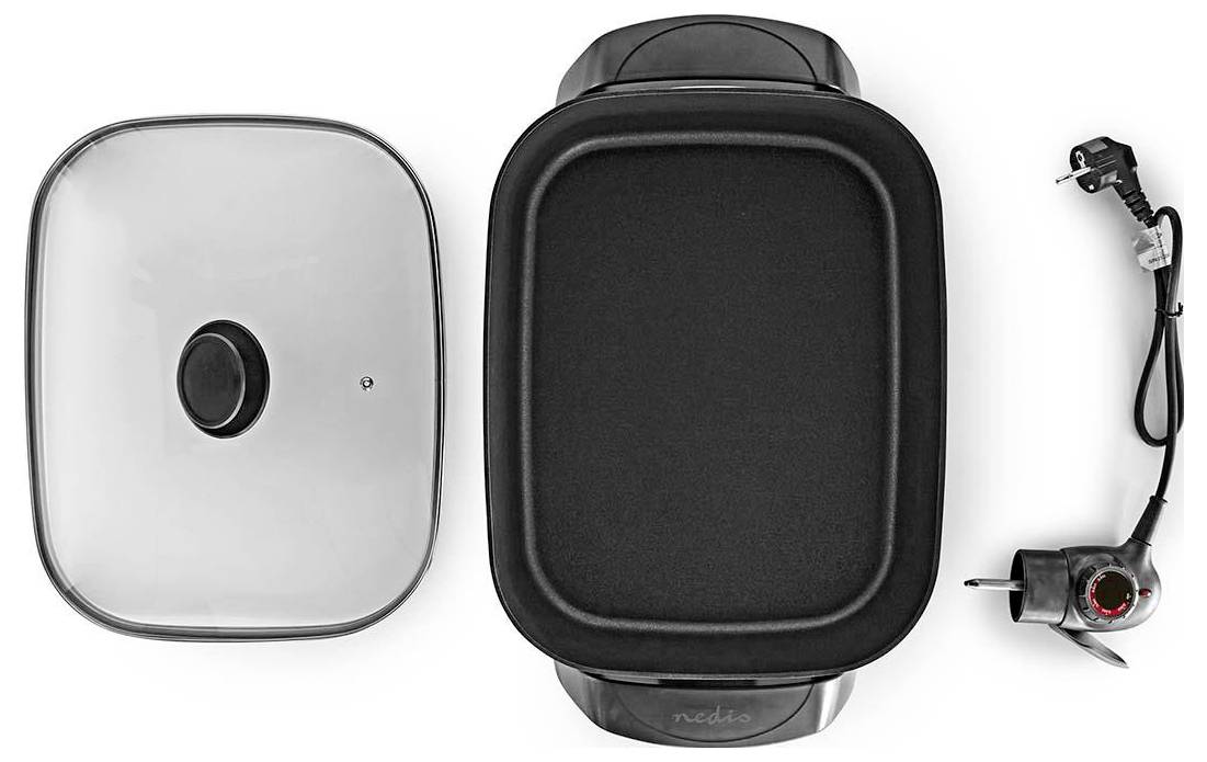 Elektryczny grill płytowy z odłączaną szklaną pokrywą, nieprzywierającą powierzchnią do gotowania i wtyczką regulacji temperatury. Odpowiedni do gotowania w pomieszczeniach.