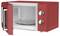 Czerwona kuchenka mikrofalowa z otwartymi drzwiczkami, ukazująca wnętrze oraz pokrętła sterujące po prawej stronie.