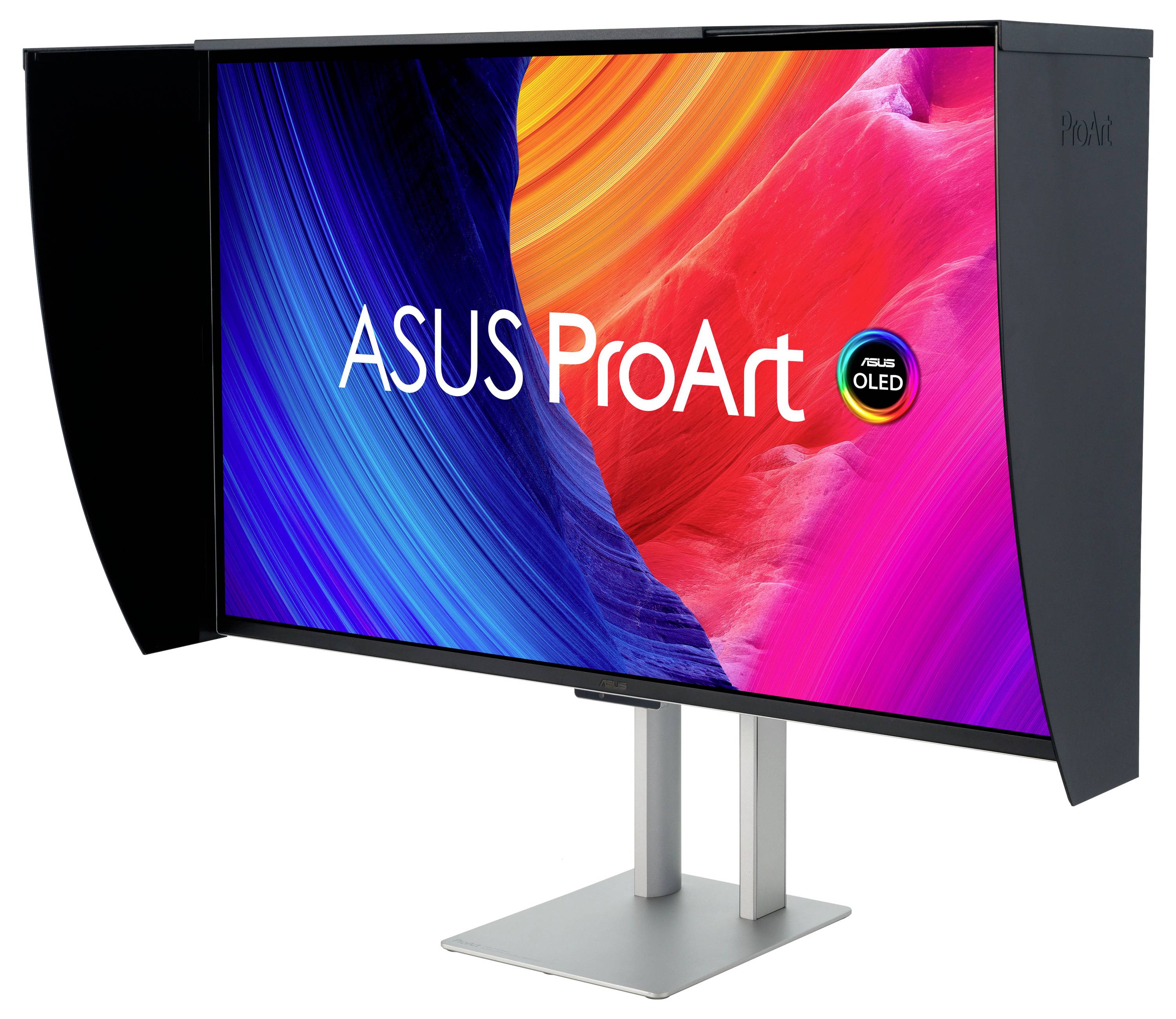 Monitor ASUS ProArt OLED z osłoną do kalibracji kolorów, wyświetlający żywe kolory abstrakcyjne.