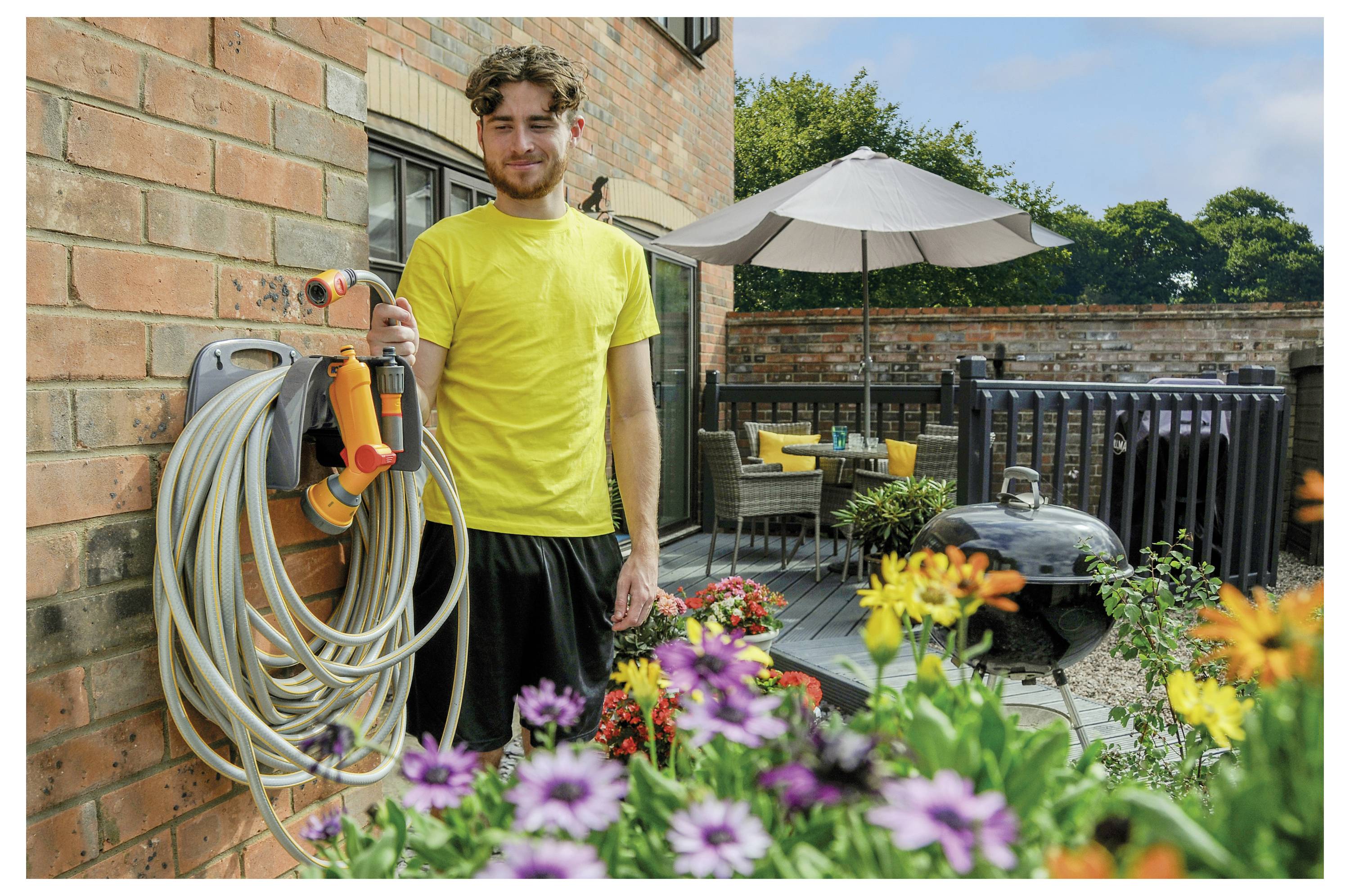 Настенный держатель для шланга Hozelock 100-101-617, 1 шт., черный.