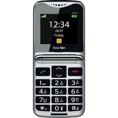 Srebrny telefon klapkowy z dużą klawiaturą wyświetla na ekranie '12:34, 28.07, Friday'. Widoczne są ikony sygnału, baterii i sieci.
