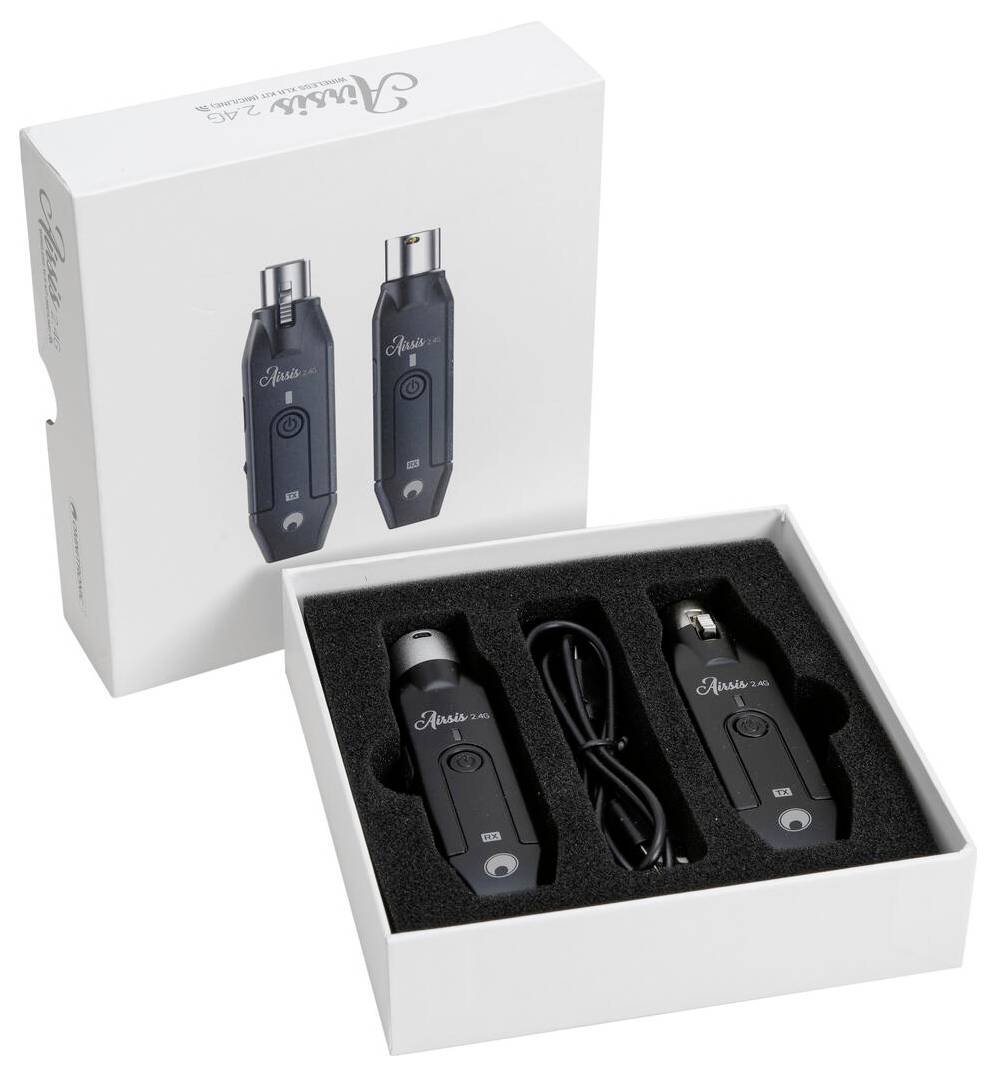 Pudełko zawierające dwa czarne urządzenia interfejsu audio oznaczone etykietą „XLR". Pudełko zawiera kabel, a wieko pokazuje obrazy urządzeń.