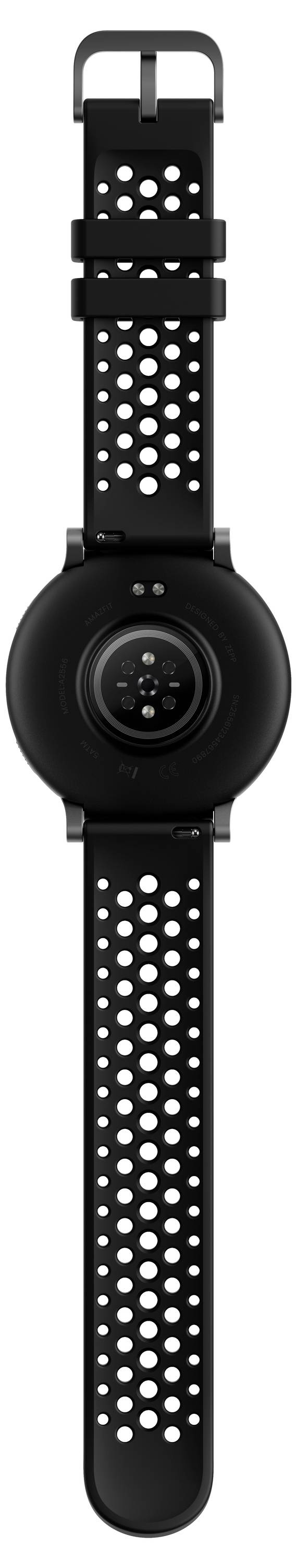 Czarny smartwatch z wymiennym paskiem zawierającym okrągłe perforacje zapewniające oddychanie. Tył zegarka pokazuje czujnik i punkty ładowania.