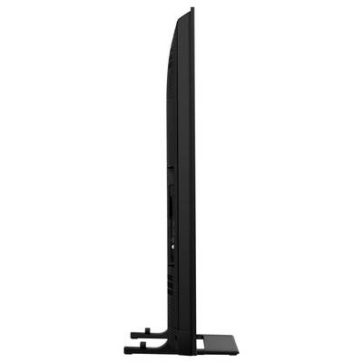 Widok z boku smukłego, nowoczesnego telewizora na płaskim ekranie stojącego na minimalistycznym czarnym statywie, prezentującego jego elegancki i cienki design.