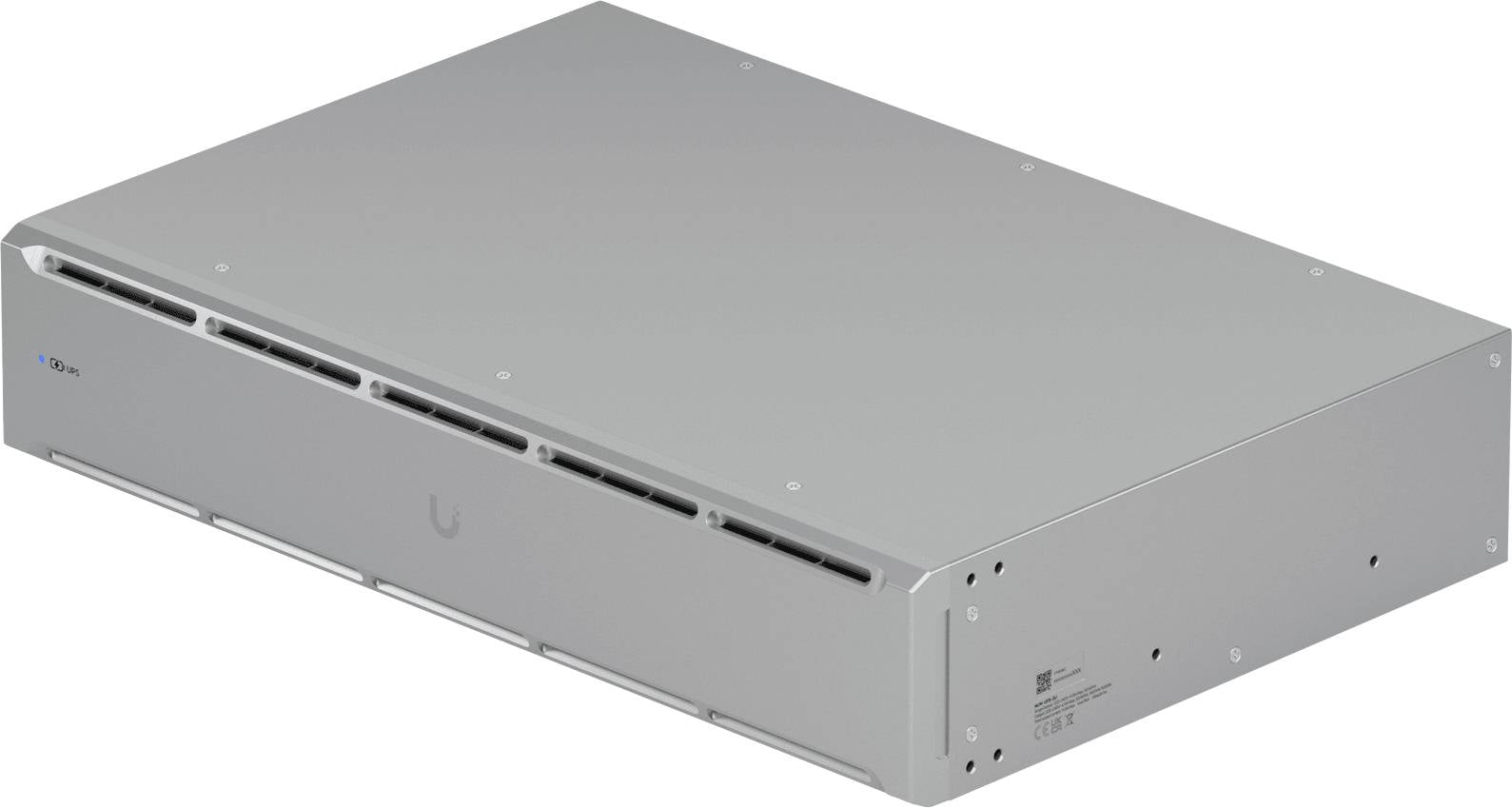 Srebrny przełącznik sieciowy z widocznymi szczelinami wentylacyjnymi i portami z boku, używany do łączności sieciowej w centrach danych lub biurach.