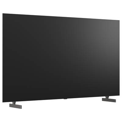 Duży telewizor plaski ekran z ciemnym pustym wyświetlaczem na stojaku, pokazany na białym tle.