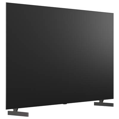 Telewizor z płaskim ekranem z czarnym pustym ekranem na białym tle, pokazany pod lekkim kątem z dwoma nogami podstawy.