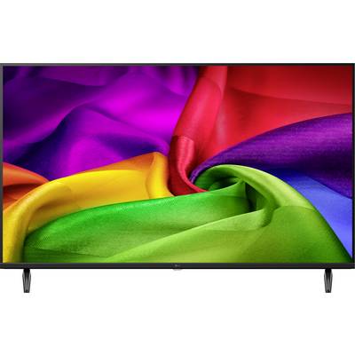 Telewizor z płaskim ekranem wyświetlający żywą abstrakcyjną pracę malarską z tęczowymi wirami na czarnej ramce z podstawką.