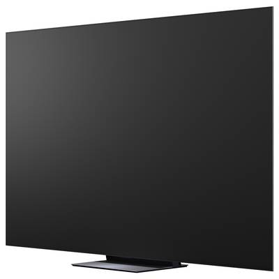 Duży czarny telewizor/monitor plaski wyświetlacz pokazany pod kątem na statywie, wyizolowany na białym tle.