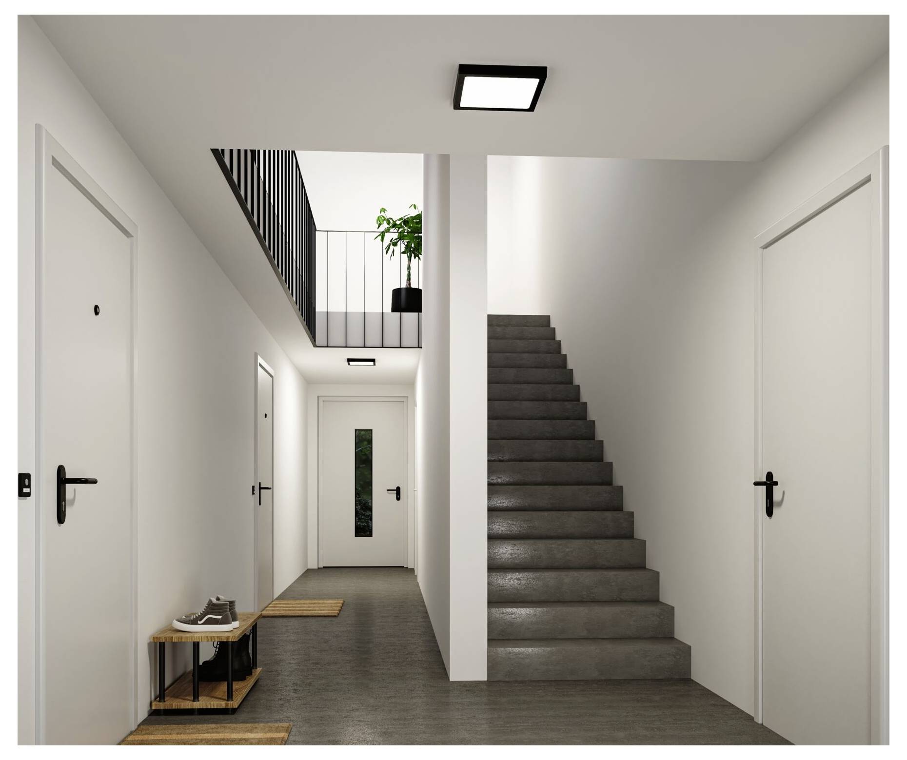 Nowoczesny korytarz apartamentowy z wieloma białymi drzwiami, klatką schodową po prawej stronie i małą rośliną na górnym półpiętrze.