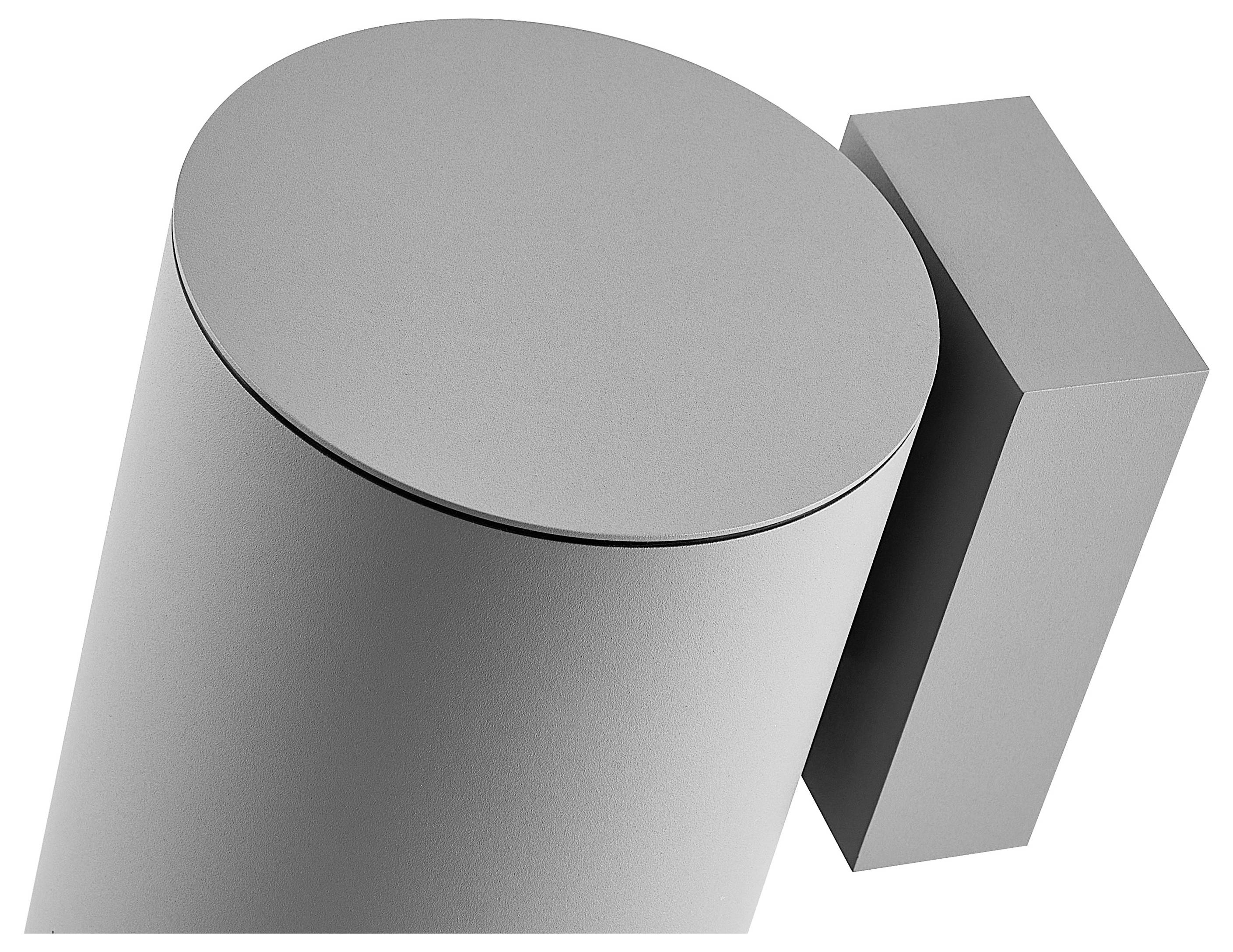 Abstrakcyjna szara 3D walcowy cylinder obok prostokątnego bloku na białym tle.