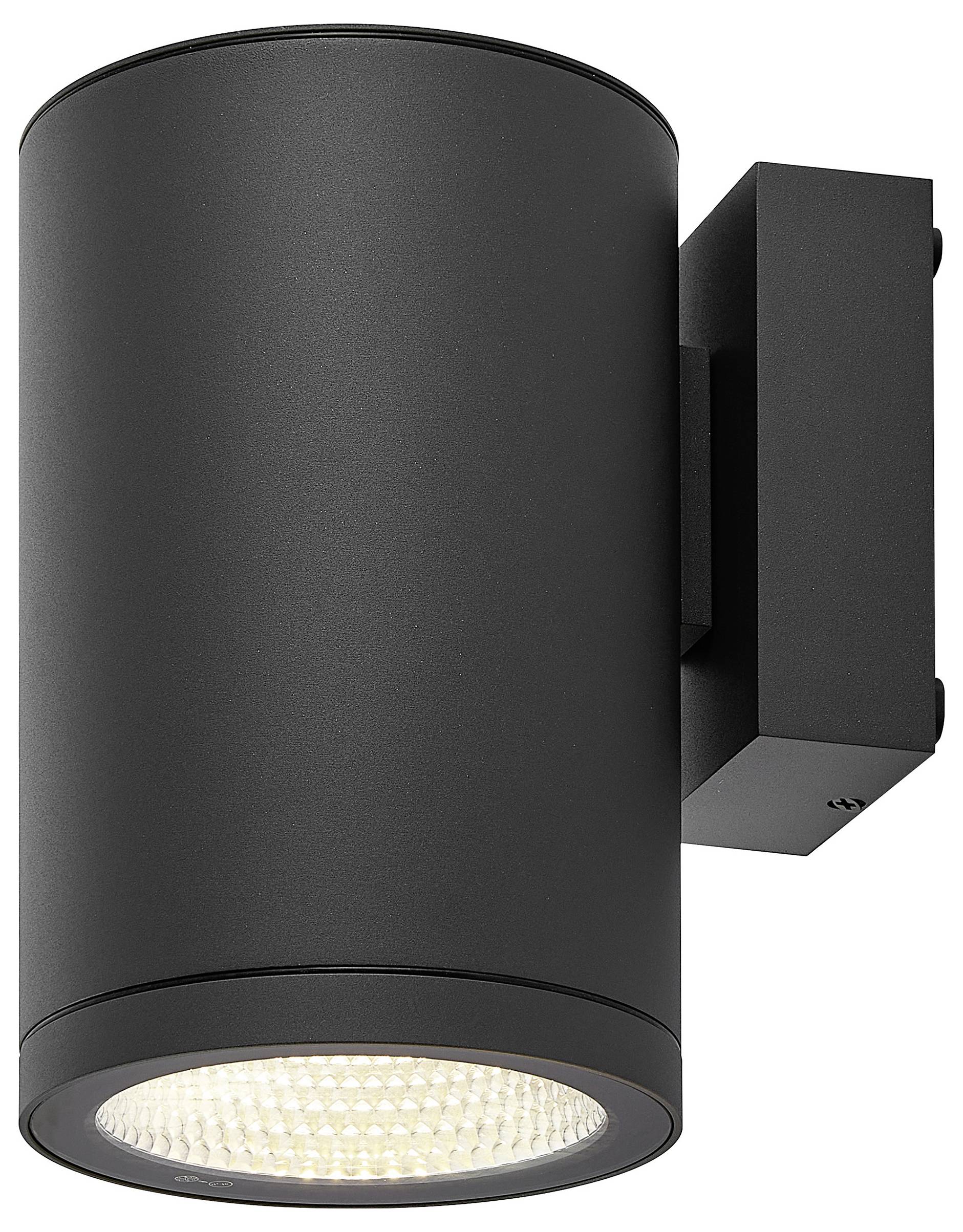 Czarna cylindryczna ścienna lampa LED z metalowym wspornikiem i świecącą soczewką na dnie.