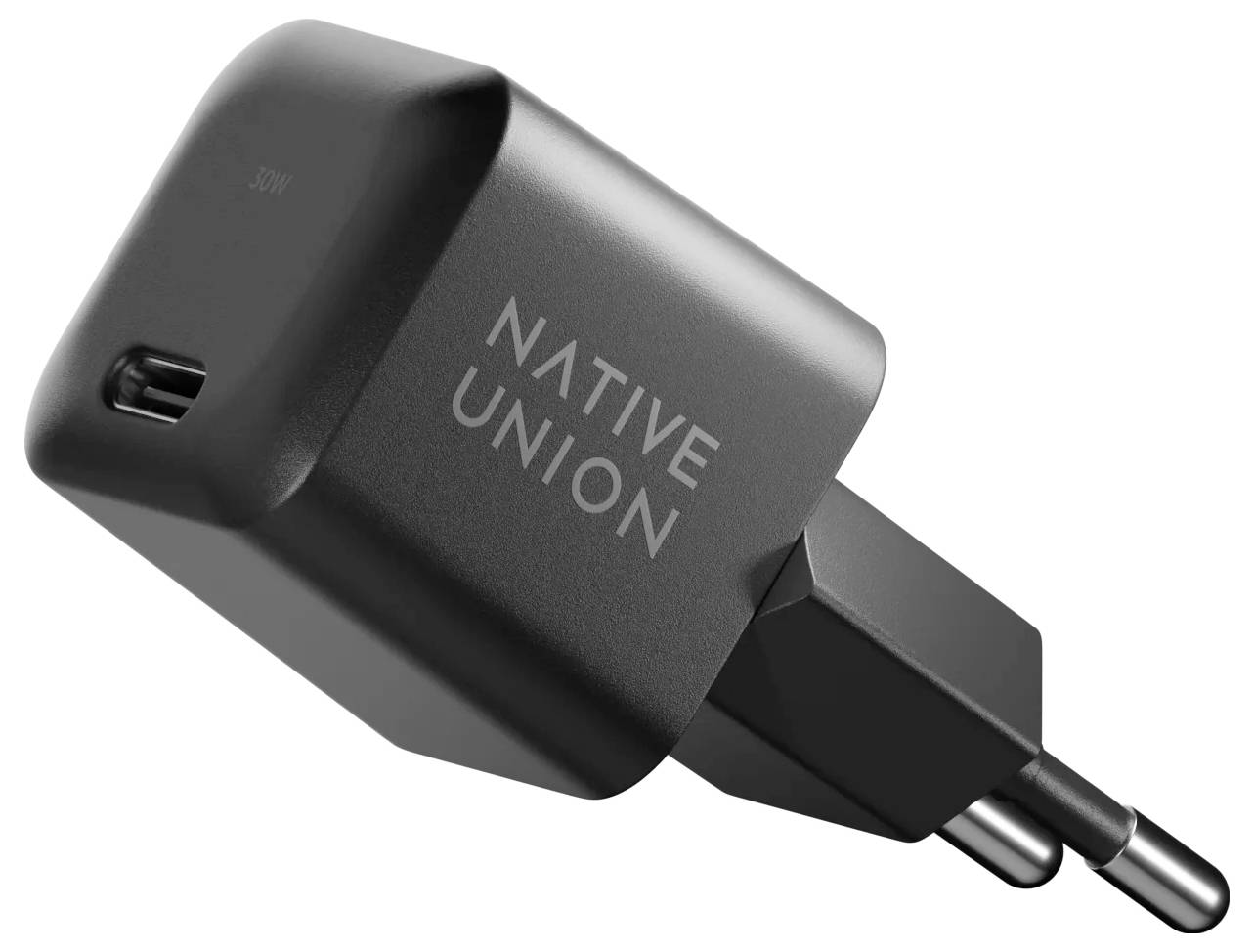 Czarny ładowacz sieciowy Black Native Union z portem USB-C i dwoma okrągłymi szpilkami wtyczki europejskiej na białym tle.