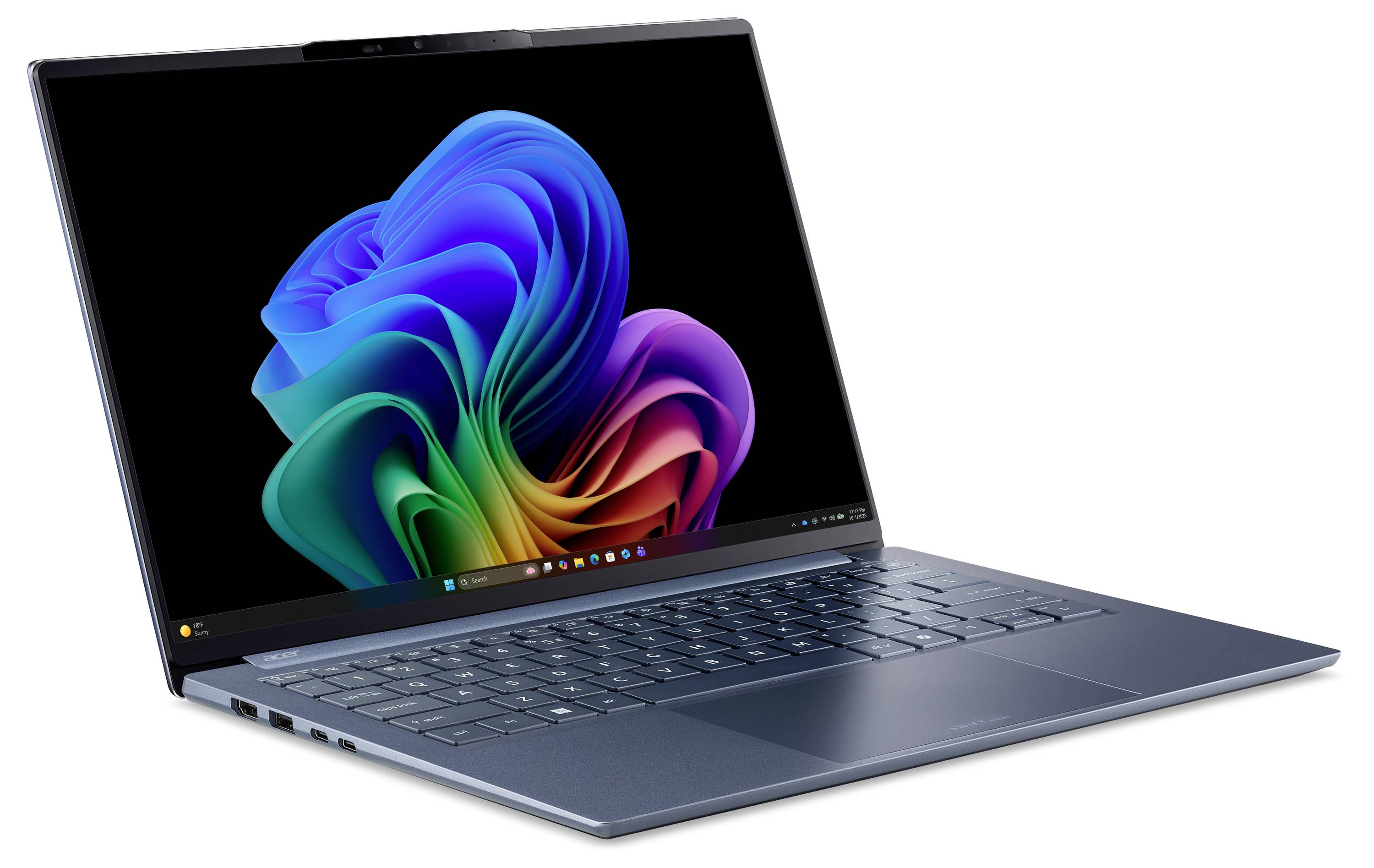 Otwarty laptop wyświetlający kolorową abstrakcyjną tapetę w stylu Windows'a z zawirowaniem na ciemnym ekranie.