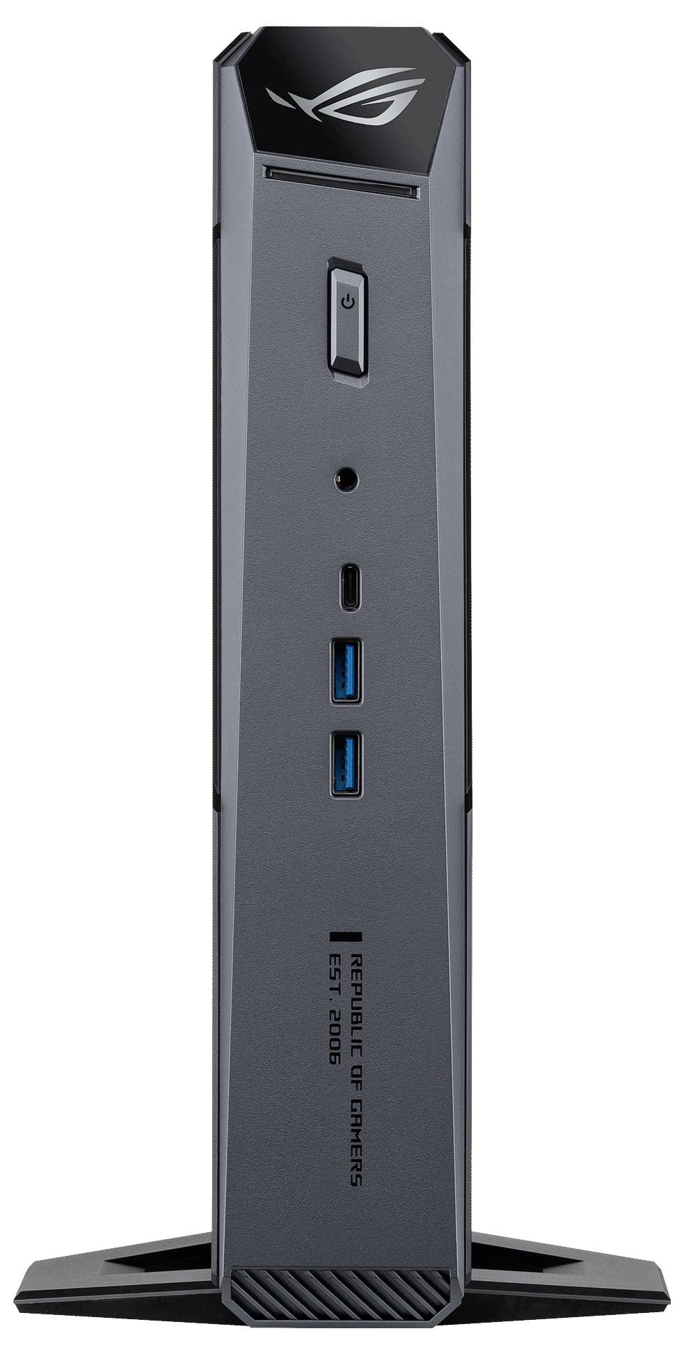 Widok z przodu stojaka lub doku mini PC ASUS ROG z przyciskiem zasilania, portami i logo ROG na czarnej podstawie.
