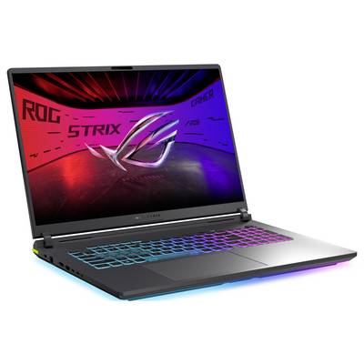 Otwarty laptop do gier wyświetlający 'ROG STRIX' i 'CARRER' na ekranie z gradientem od czerwieni do błękitu, z podświetlaną klawiaturą RGB i logo ROG.