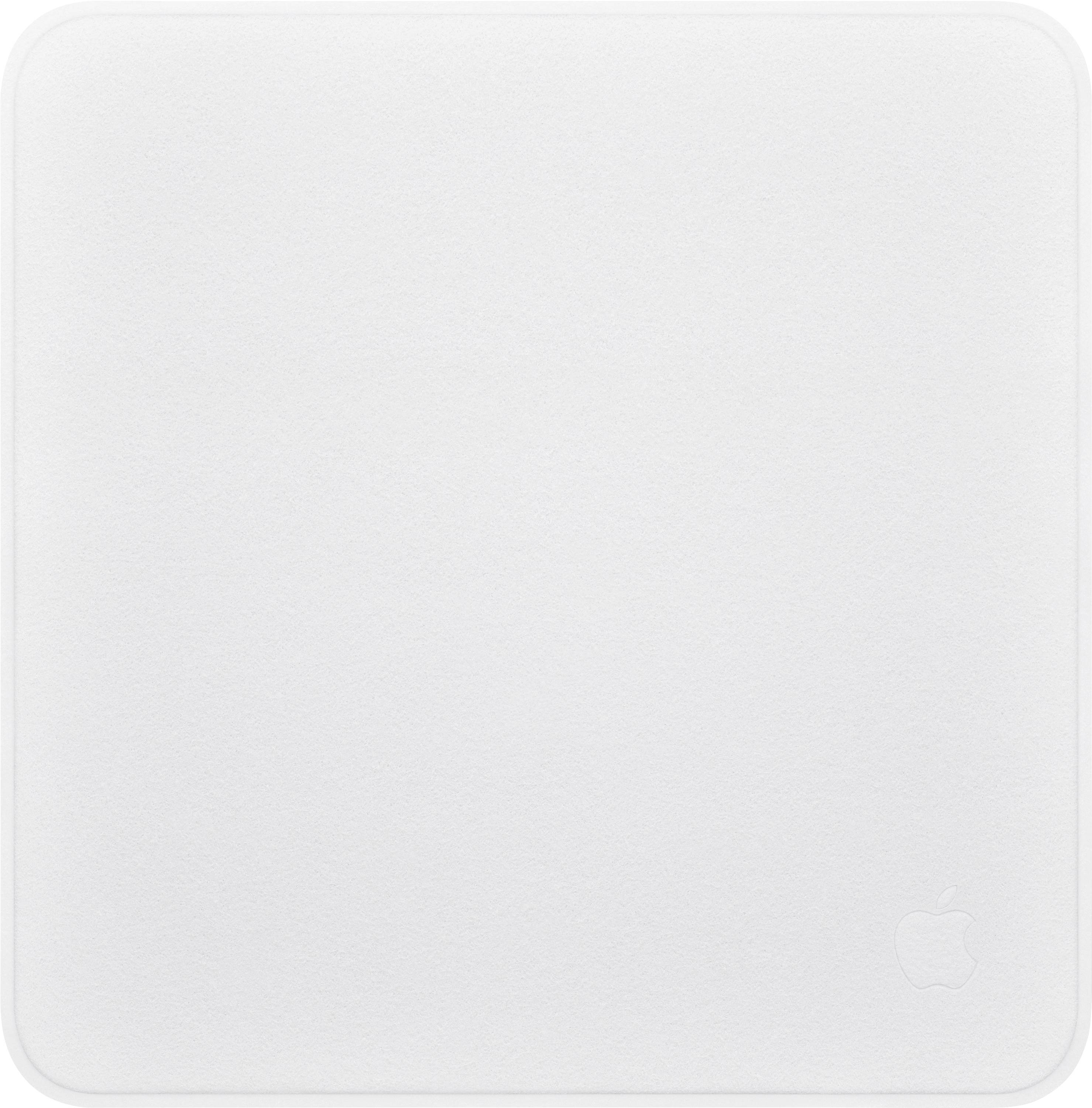 Zbliżenie na srebrną wieczko MacBooka Apple z logo Apple w prawym dolnym rogu.