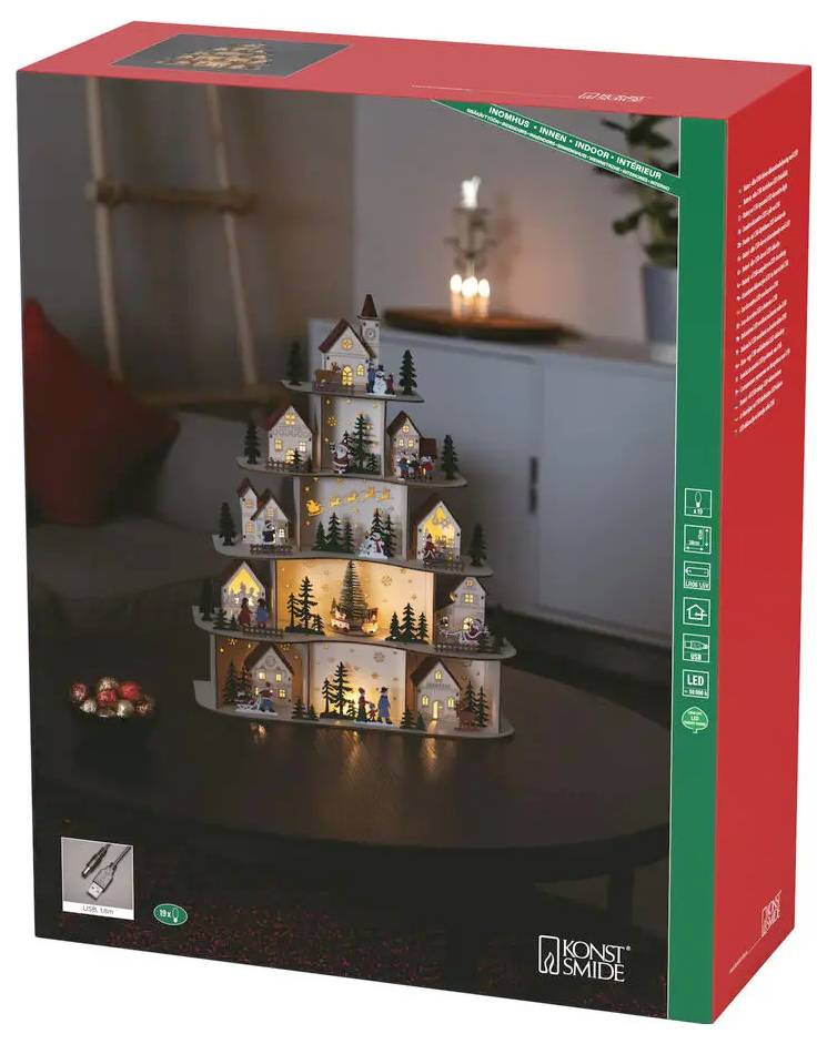Zestaw do dekoracji świątecznej wioski Konstsmide z oświetleniem w czerwonym opakowaniu produktu, pokazujący piętrowe oświetlone domy i drzewa.