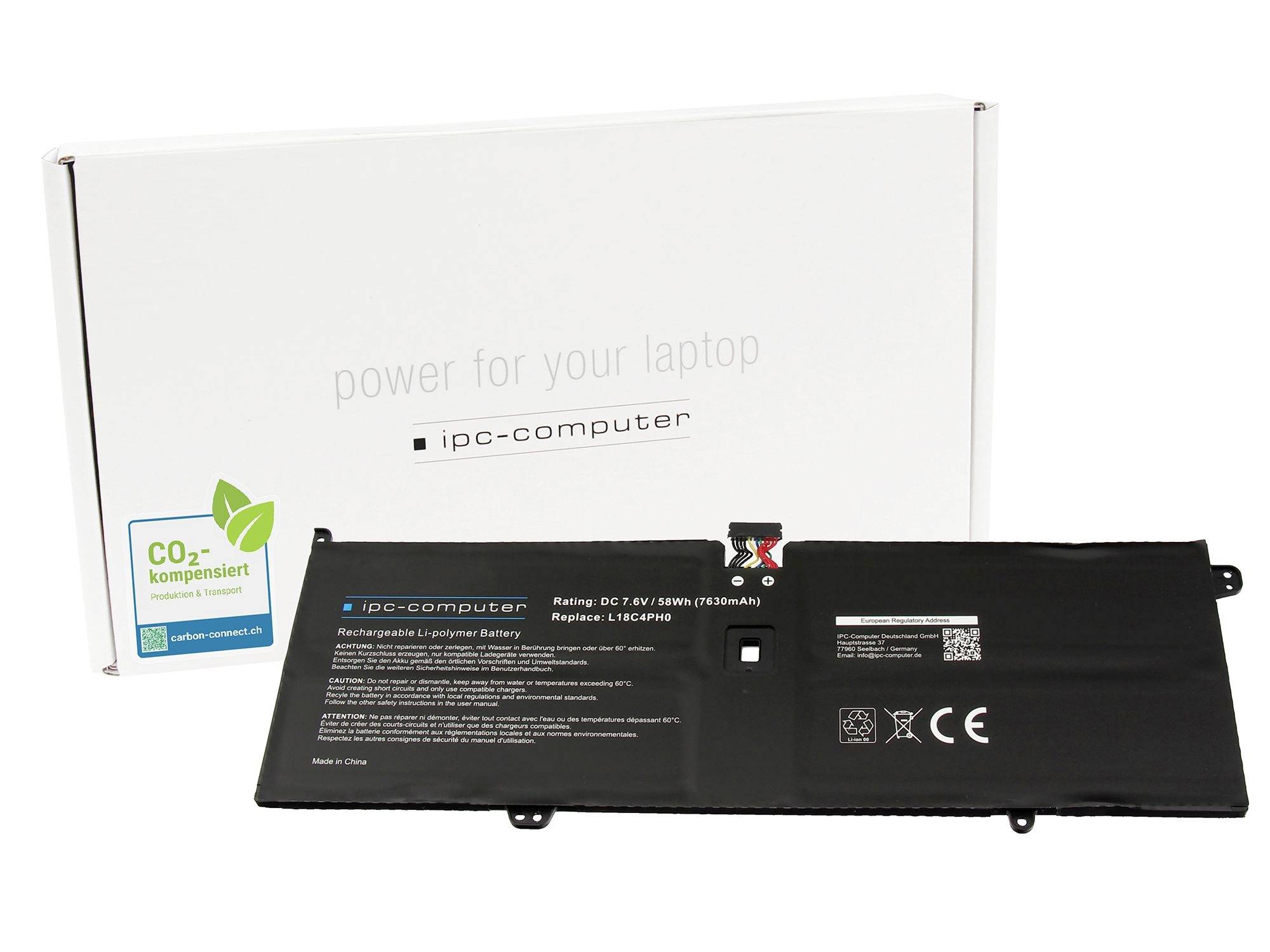 Pakiet baterii laptopa przed pudłem komputera IPC oznaczonym „zasilaniem dla twojego laptopa" i CO2-kompensiert.