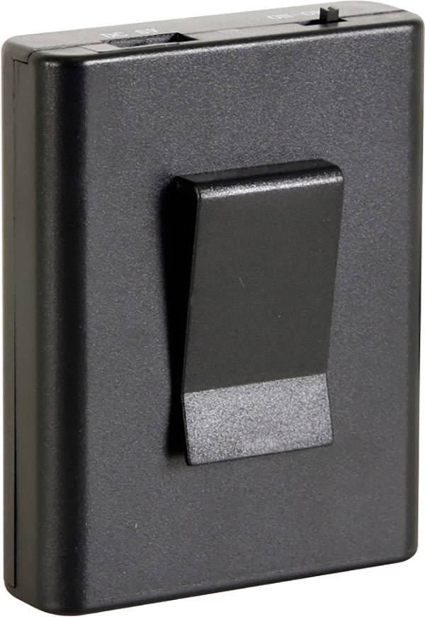 Czarne prostokątne urządzenie z klipsem na tylnej stronie.