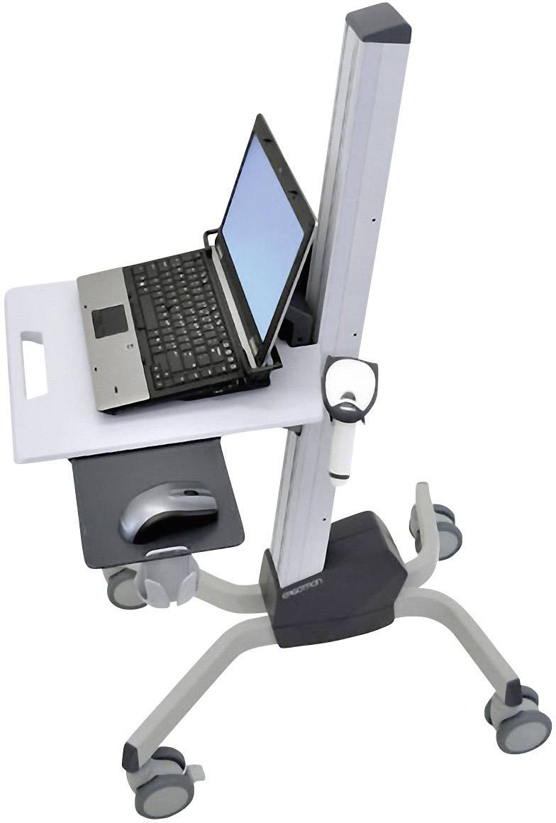 Laptop stoi na mobilnym pulpicie stojącym na kółkach, który ma regulowaną wysokość. Podkładka pod mysz jest przymocowana z boku.