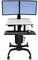 Regulowany na wysokość stolik na kółkach z dwoma monitorami ustawionymi obok siebie, klawiaturą i myszą umieszczonymi na osobnych półkach.