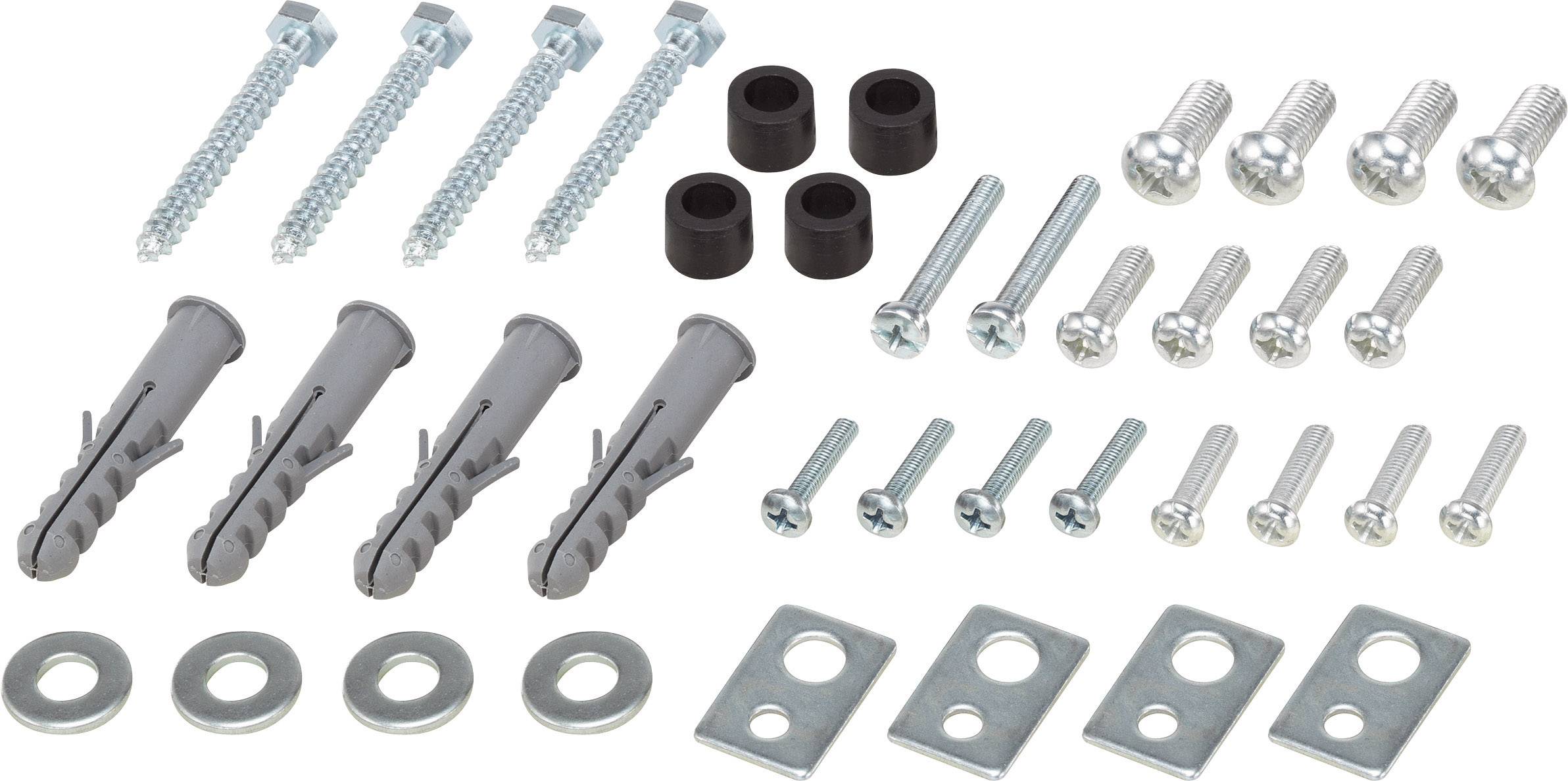 Różne elementy metalowe i z tworzyw sztucznych: śruby, kołki, nakrętki, dystanse i podkładki na białym tle.