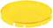 Okrągła, płaska, żółta plastikowa pokrywka z małymi nacięciami na krawędzi.