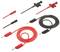 Różne czerwone i czarne końcówki pomiarowe i kable z zaciskami krokodylkowymi, używane do pomiarów i testów elektrycznych.