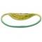 Nieznany przedmiot, prawdopodobnie wykonany z tworzywa sztucznego, w kolorach żółtym i zielonym o płaskim, owalnym kształcie.
