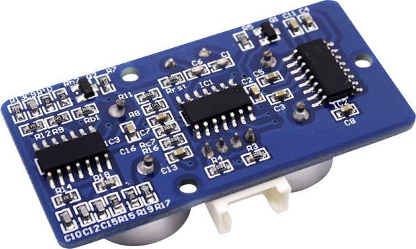 Płytka elektroniczna z wieloma zintegrowanymi obwodami, kondensatorami i rezystorami. Niebieskie podłoże PCB z ciemnymi chipami.