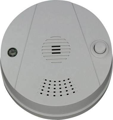 Biały czujnik dymu o okrągłym kształcie, z widocznym głośnikiem i przyciskiem testowym. Chroni przed zadymieniem i pożarami.