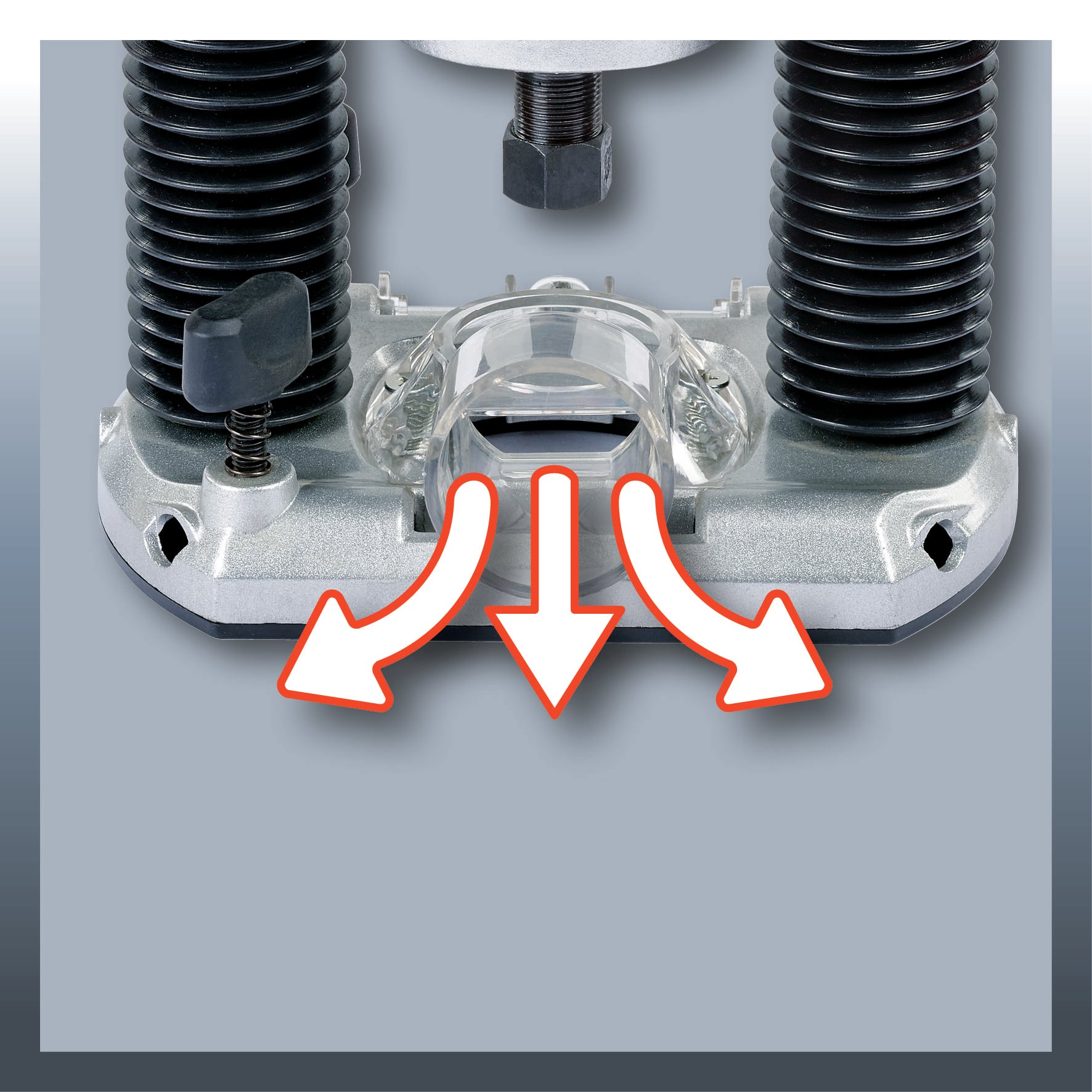 Zbliżenie narzędzia z trzema czerwonymi strzałkami wskazującymi środek przezroczystej części plastikowej, ilustrujące kierunek przepływu powietrza.