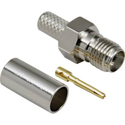 Adapter wtykowy koncentryczny w częściach składowych, składający się z metalowej obudowy zewnętrznej, wkładu wtykowego oraz złoconej końcówki styku.