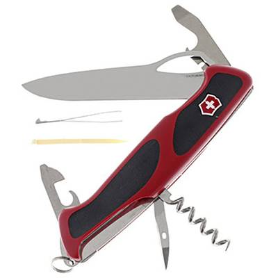 Scyzoryk z czerwoną rękojeścią, prezentujący różne rozłożone narzędzia: ostrze, korkociąg, otwieracz do puszek oraz inne.